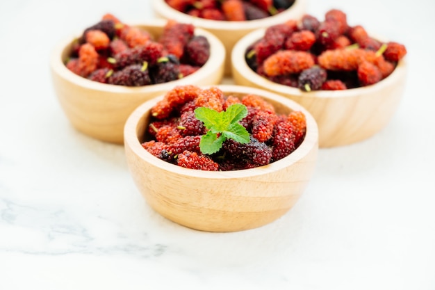 Black mulberry fruit in bowl