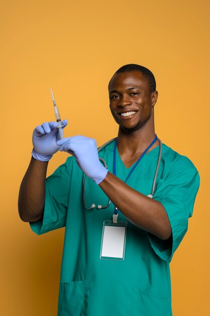 Black nurse man getting ready for work
