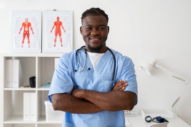 Free photo black nurse at their workspace