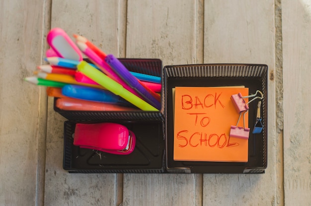 Black organizer with school supplies