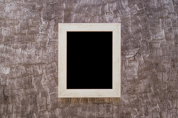 Black picture frame on painted design wall