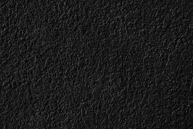 Черный простой бетон текстурированный фон