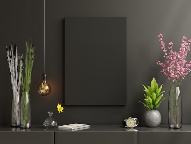 Black poster frame on cabinet in living room interior on empty dark black wall ,3d rendering