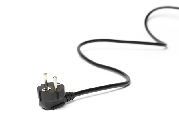 Free photo black power cable with plug and socket isolated on white