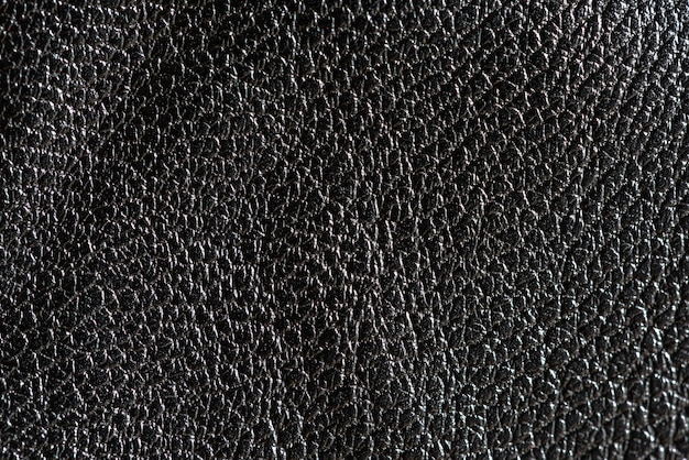 Free photo black rough leather textured background