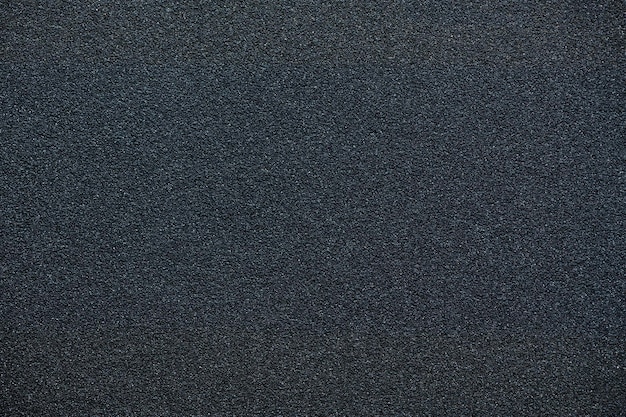 Black sandpaper surface texture background