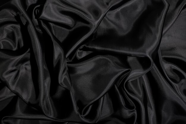 Черная шелковая ткань текстура фон