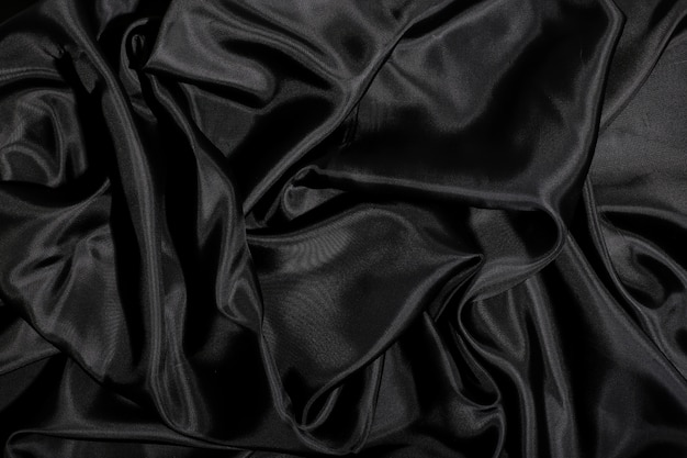 Черная шелковая ткань текстура фон