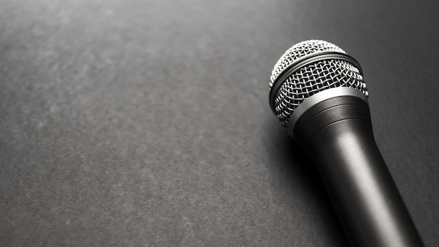 Black and Silver Microphone On a Black Background