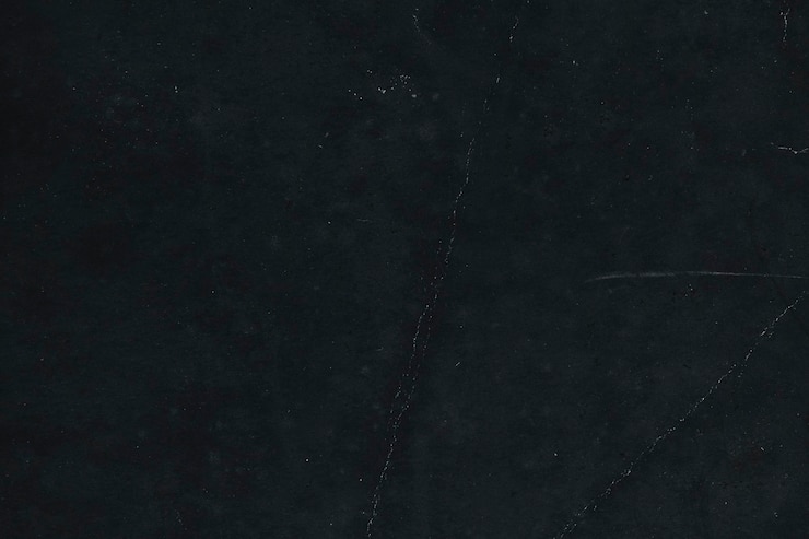 Free Photo black smooth textured paper background