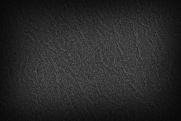 Free photo black smooth textured paper background