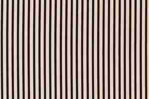 Free photo black striped pattern on cream background