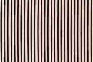 Free photo black striped pattern on cream background