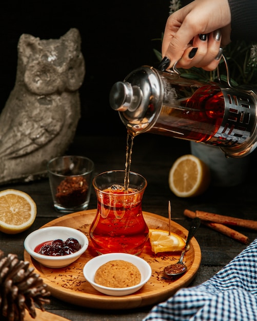 Black tea served with sweets