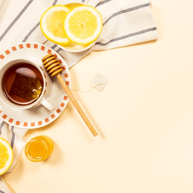 Black tea with honey and fresh lemon slice