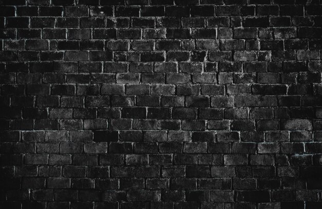黒のテクスチャレンガの壁の背景