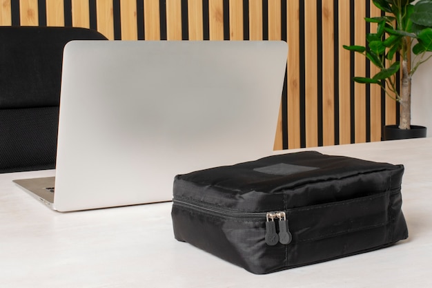 Black toilet bag and laptop