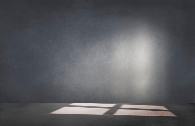 Black wall in an empty room with concrete floor