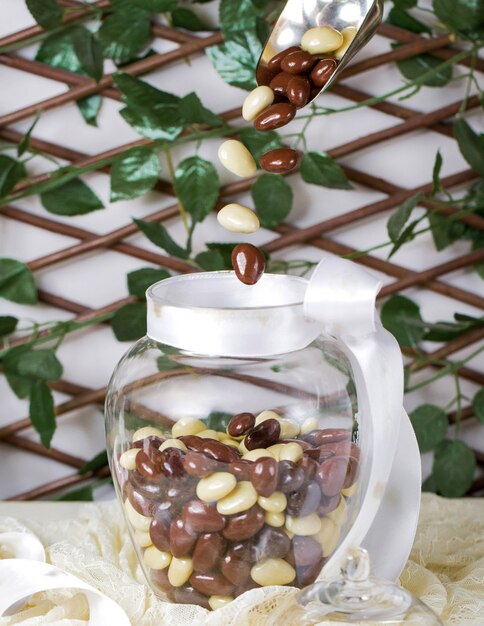 Black and white chocolates in the bottle