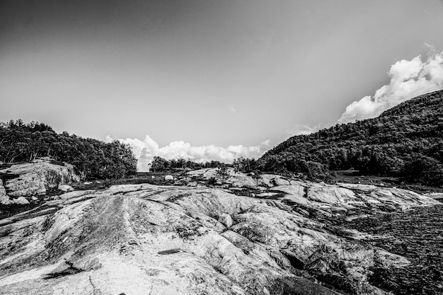 Free photo black and white dramatic landscapes with rocks