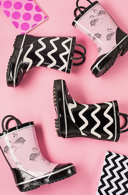 Free photo black and white rubber boots or gardening boots