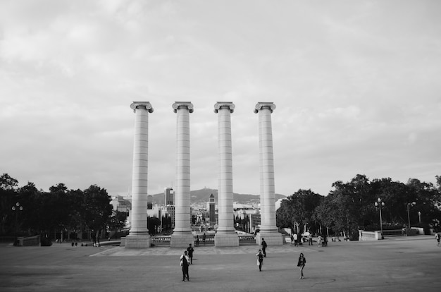 Black and white shot of architectural columns in the park