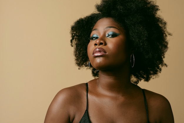 Black woman posing in studio medium shot