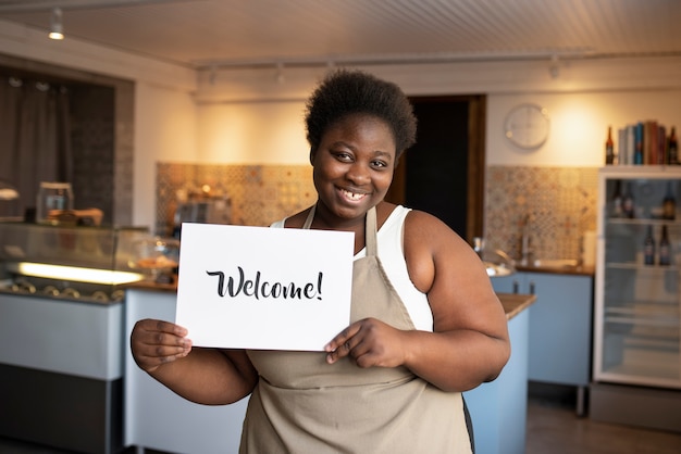 Free photo black woman running a small business