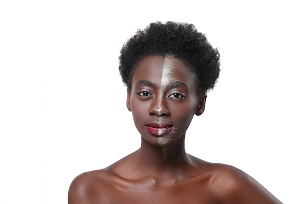 Black woman with half face on makeup, beauty concept