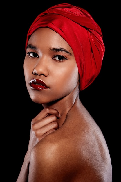 Free photo black woman with red bright lips with red scarf on head