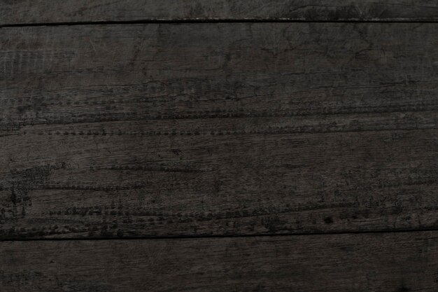 黒い木の板の織り目加工の背景