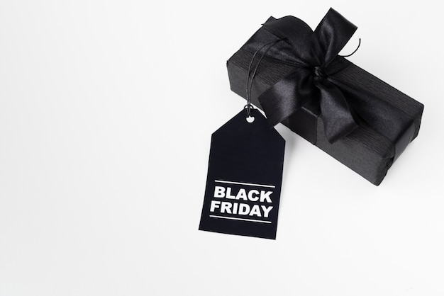 Black wrapped gift with black friday tag