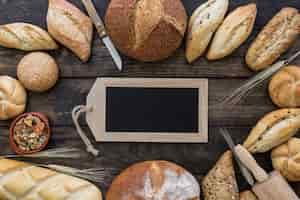 Free photo blackboard and bakery on table