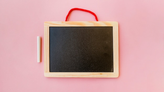 Blackboard in frame with chalk 