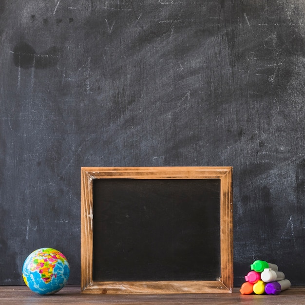 Blackboard frame with glove and markers