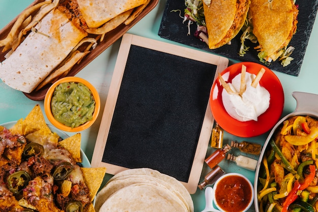 Blackboard and Mexican dishes composition