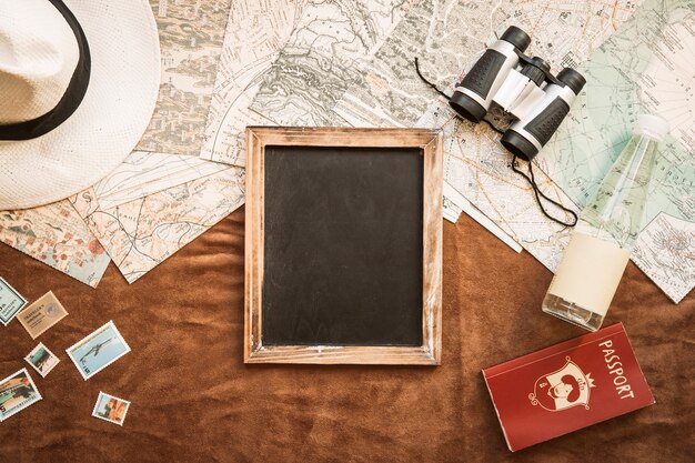 Blackboard and touristic stuff on table