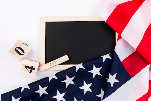 Blackboard and USA flag on white background