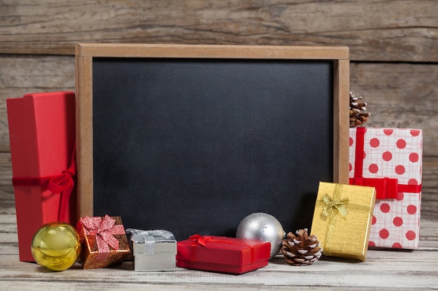 Blackboard with gifts around