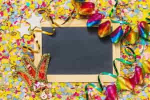 Free photo blackboard with party decoration