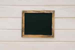 Free photo blackboard with wooden frame