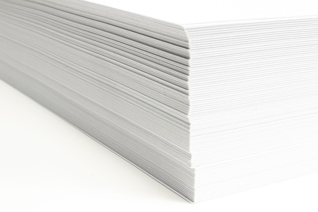 Blank ar letterheads stack macro view with selective focus on white background.