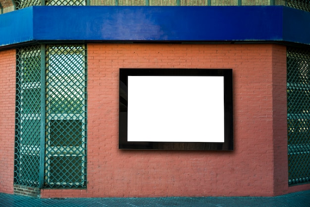 Free Photo blank billboard on wall