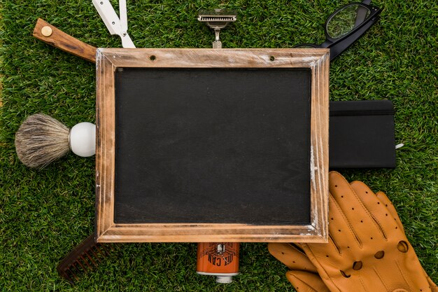 Blank blackboard with decorative items for father's day