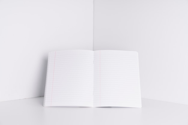 Blank book in corner of room