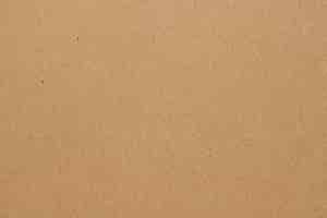 Free photo blank brown paper textured wallpaper