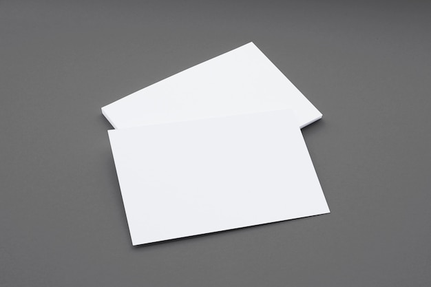 Free photo blank business cards composition isolated on grey