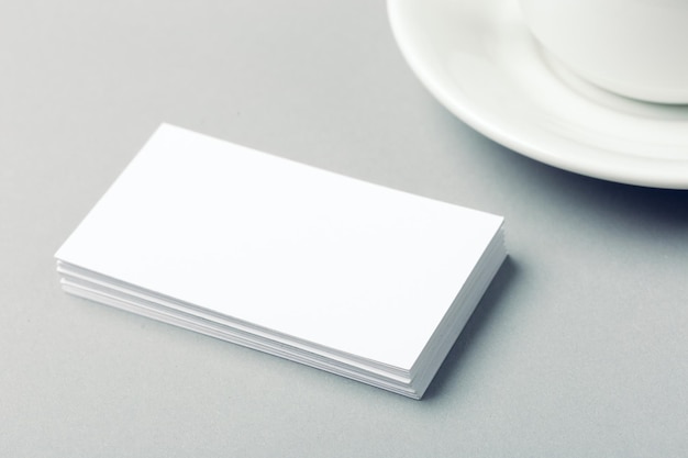 Free photo blank business cards on grey background