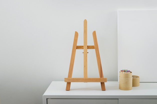 Free photo blank canvas for painting indoors still life