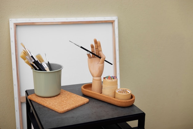 Free photo blank canvas for painting indoors still life